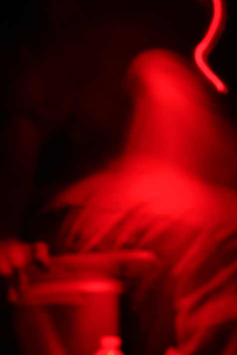 Pics of the Week Misprint ::: Red Light © Greg Ryden AIA Photo of guy in a bar surrounded by red light